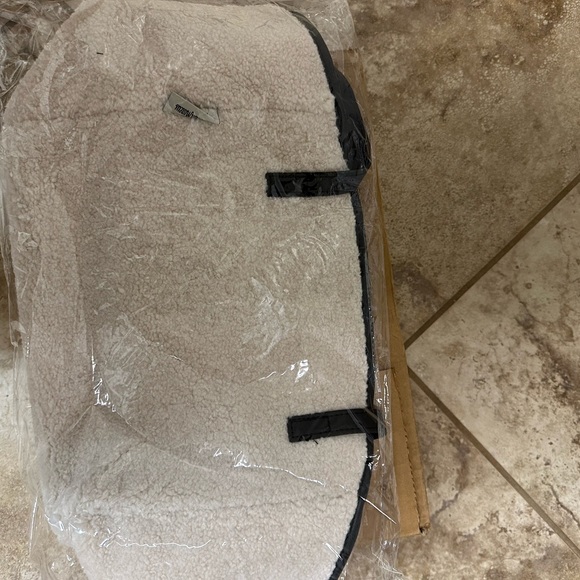 Tote Bag in cream ;Neiman Marcus
Faux Shearling Tote with makeup bag - Picture 2 of 9